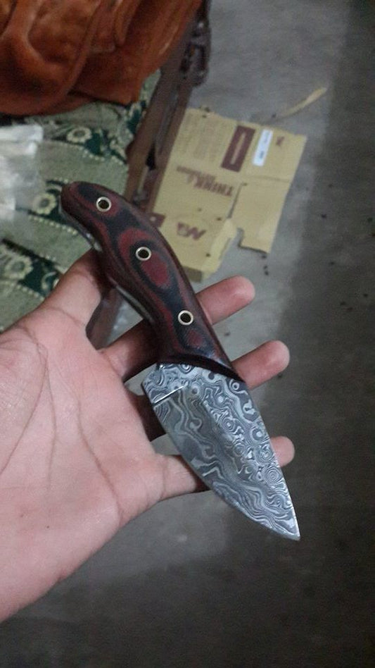 damascus rain drop pattern skinning knife